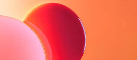 Abstract forms in pink and red dominate the frame with an orange gradient background photo