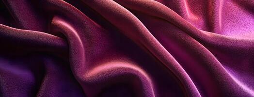 Abstract pink fabric cascades gracefully, showing its shiny textures and captivating color shifts photo