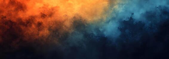 An ombre of fiery orange fades to tranquil blue against a shadowy backdrop photo