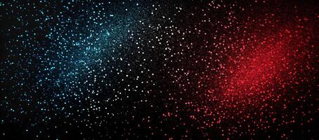 Blue transitions to red sparkling particle dust on black background creates dynamic contrast photo