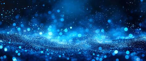 Brilliant blue bokeh lights and shimmering particles create an atmospheric and visually stunning background photo