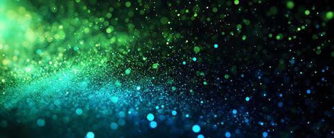 Floating green and blue bokeh lights gradually fade to black in a mesmerizing display photo