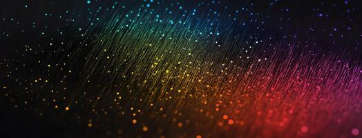 Gradient rainbow lights cascade down a dark background creating a colorful abstract effect photo