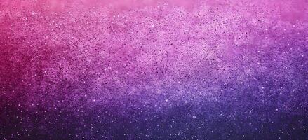 Gradient sparkles create an abstract effect moving from light pink to dark purple tones photo