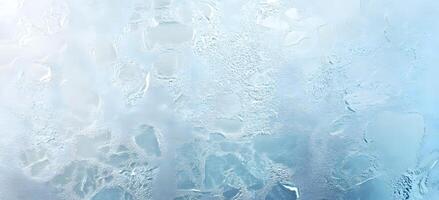 Ice crystals and condensation creates a captivating abstract pattern on a window surface photo