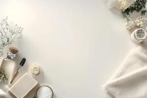 Luxurious towels, scrub, soaps, and skincare products are carefully arranged on a clean, white surface photo