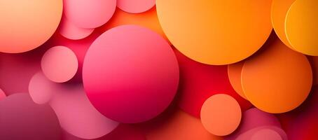 Orange and pink glossy spheres intersect, creating a visually appealing colorful abstract background photo