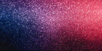 Pink and blue gradient texture displaying a vibrant glitter effect across the abstract background photo
