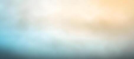 Serene blurred background evokes a sense of calmness with soft blue blending into gold photo