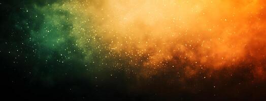 Sparkling particles flow through gradient of green, yellow, and orange abstract space photo