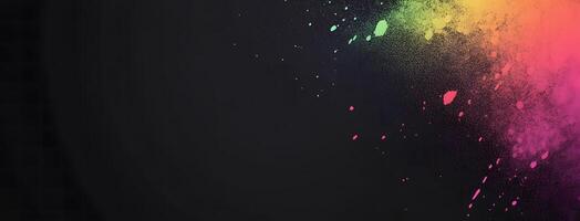 Splashes of vivid, vibrant color explode across the deep black canvas, creating a dynamic effect photo