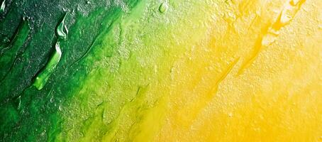 Textured gradient background shows liquid green to yellow color transitioning smoothly on the surface photo