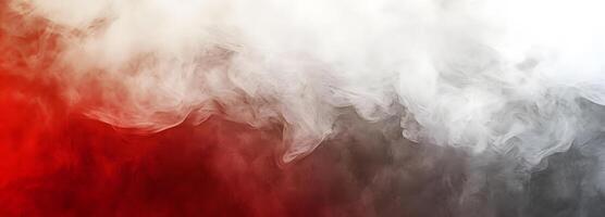 White smoke gradually dissipates into a soft red backdrop, providing an abstract cloudlike effect photo