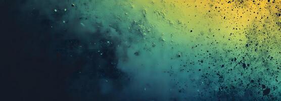 Yellow and blue merge in this textured artistic background with black splatter effect photo
