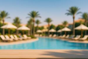 Blurred Tropical Resort Scene Featuring Swimming Pool and Sun Loungers for Luxury Vacation Relaxation and Copy Space for Travel Advertisement photo