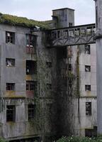 Abandoned building in Vigo, Spain, in the evening hours photo