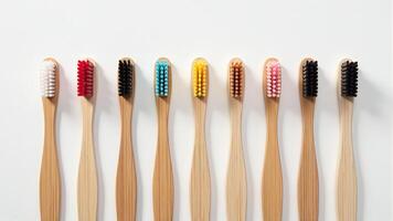 Collection Of Bamboo Toothbrushes On White photo