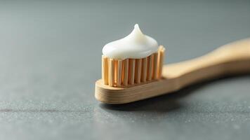 Toothpaste On Bamboo Toothbrush, Close-Up photo