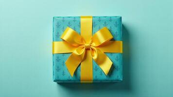 Wrapped Gift Box With Yellow Ribbon photo