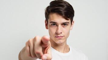 Young Man Pointing at Camera photo