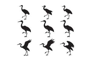 A set of silhouettes of cranes vector
