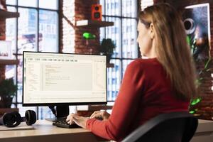 AI driven chatbot on a computer monitor assisting a person with tasks, exemplifying digital innovation. Employing communication through smart automation and efficient machine learning tools. photo