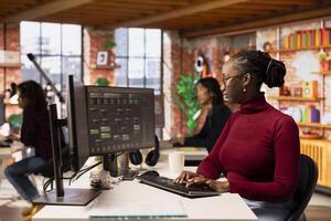 Programmer coding advanced AI algorithm in startup workspace, refining machine learning models to enhance automation and data driven decision making. Woman using coding platform in office photo