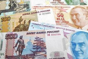 Stack of Russian Rubles and Turkish Lira photo