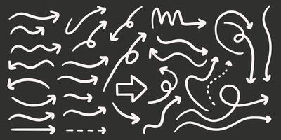 A collection of different hand drawn arrows vector