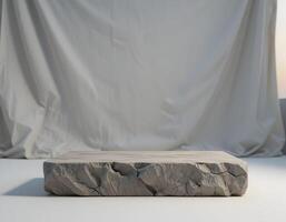 Concrete Display Platform with Draped Fabric Backdrop photo
