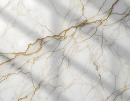 Marble Texture with Gold Veins and Subtle Shadow Overlay photo