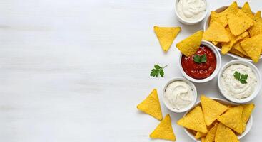 Serving Appetizing Tortilla Chips with Variety of Dips Overhead View photo