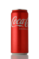 Gaziveren Cyprus -04.03.2025 Iconic red can of classic soft drink resting on a reflective surface under bright lighting png