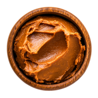 Smooth and Creamy Nut Butter in Wooden Bowl for Healthy Snack and Cooking Ideas png