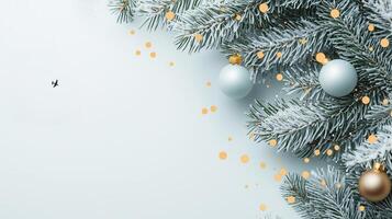 Christmas winter decoration with frosted pine cones and fir tree branches on light blue background with copy space photo