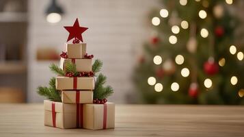 Christmas gift boxes stacked forming festive tree silhouette, adorned with red ribbons, berries, pine greenery, red star topper against soft focus holiday background photo