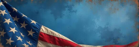 The American flag beautifully displayed against a textured blue background with aged edges photo