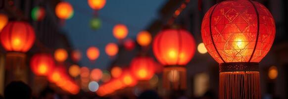 Decorative red lanterns illuminate a festive street during an evening celebration, creating a vibrant atmosphere photo