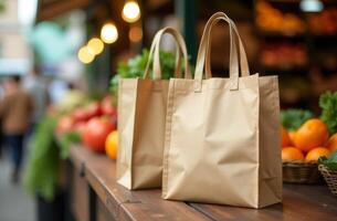 Brown shopping bags sit on a wooden table at an outdoor market filled with fresh produce and cheerful shoppers in the background during daylight photo
