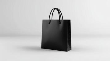 Simple black paper shopping bag displayed on a light background during indoor setting suitable for various retail environments photo
