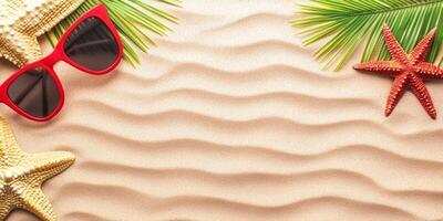 Bright beach accessories arranged on soft sand during a sunny day at the coast photo