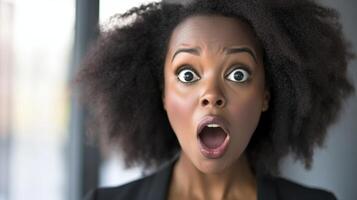 Woman expresses surprise in bright urban setting, capturing an unexpected moment of shock and excitement photo