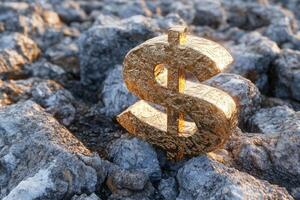 Golden dollar symbol standing on rocky terrain at sunset highlighting wealth and nature's contrast photo