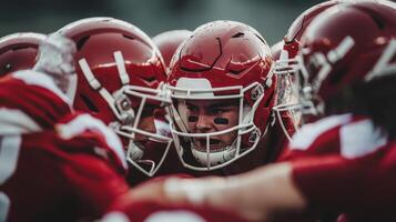 Intense football huddle during game preparation under cloudy skies in the fall season photo