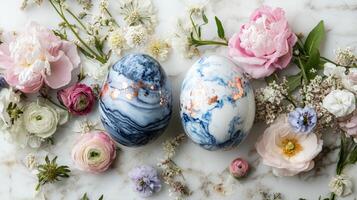 Decorative eggs resting among colorful spring flowers on a marble surface for a festive celebration photo