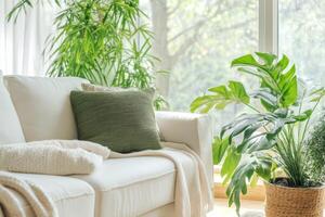 Cozy living room with plants and natural light creating a serene atmosphere during the afternoon photo