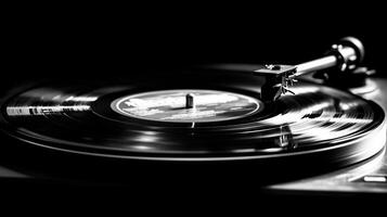 Classic vinyl record spinning on a turntable in a dimly lit room creating a nostalgic atmosphere photo
