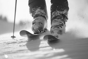 Skiing on fresh powder in a mountain landscape during winter photo