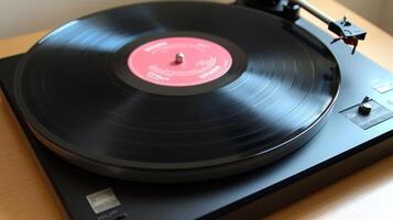 Classic vinyl record spinning on a turntable in a cozy indoor setting during afternoon light photo