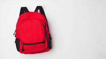 Backpack displayed on a neutral background showcasing vibrant red color and practical design for everyday use photo